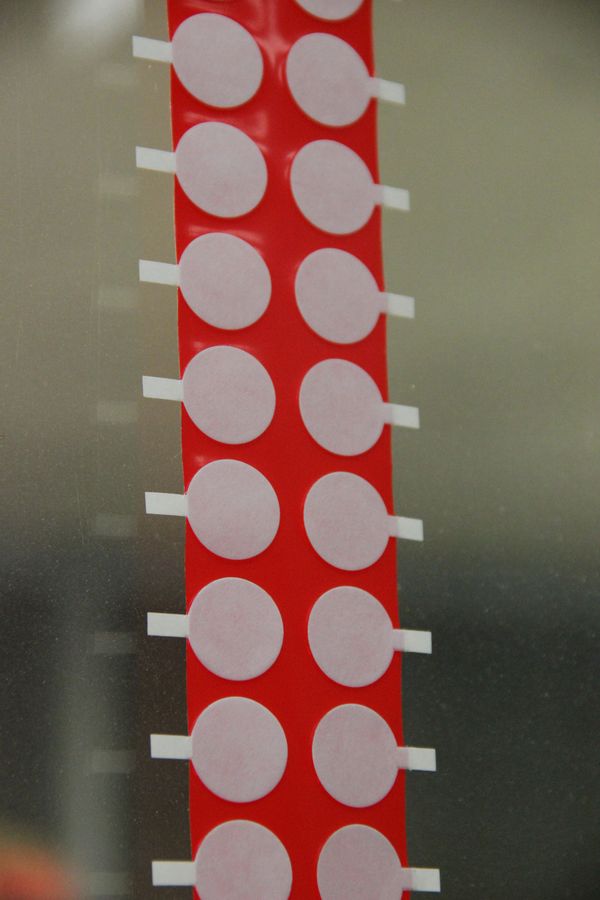 repositionable Die-cut adhesive pieces on glass